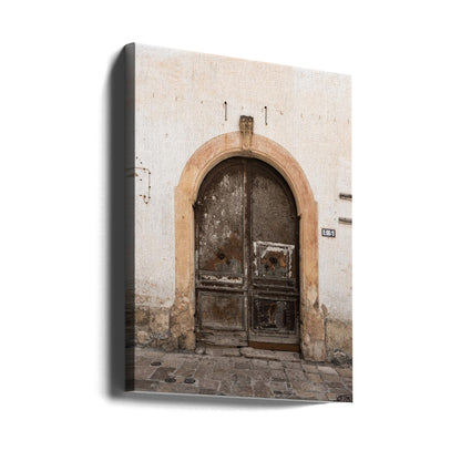 Old brown door Gallipoli, Italy