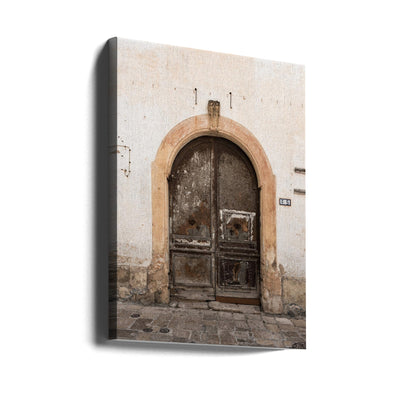 Old brown door Gallipoli, Italy