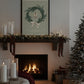 Horses toy on Christmas wreath with bow