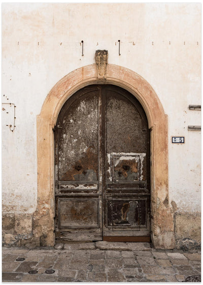 Old brown door Gallipoli, Italy