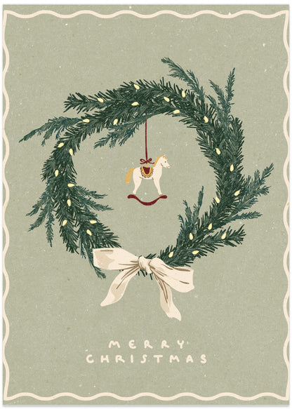 Horses toy on Christmas wreath with bow