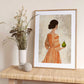 Elegant Woman Holding Pear