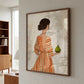 Elegant Woman Holding Pear